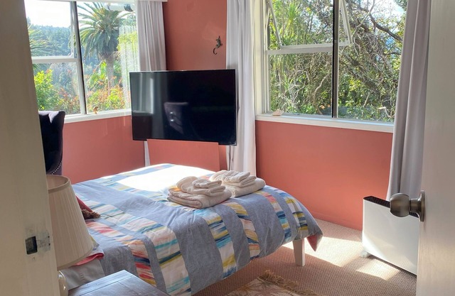 Private studio with your own waterfall garden and 5 minute walk to Hospital