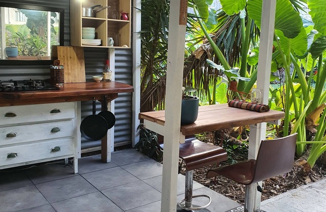 private tropical outdoor living 5 min from the beach.