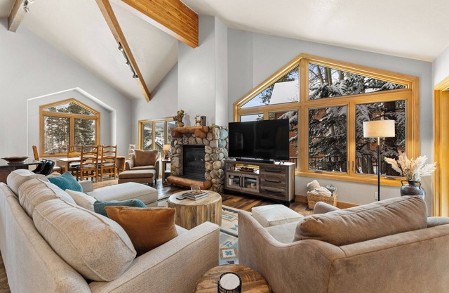 Private Wooded Setting with Open-Concept Layout and Updated Kitchen