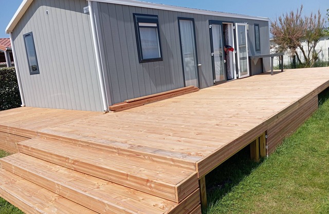 Proche des Plages du Débarquement . Mobil-home Neuf au Bord de mer