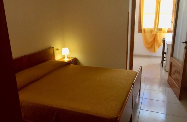 Propiedad en un complejo turístico 'Baia Falcone-Bilocale 307' con vistas al mar y aire acondicionado