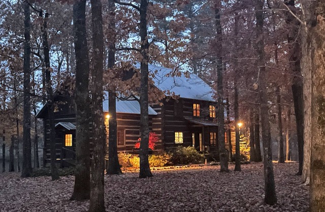 Prospect Mountain Cabin custom log home sportsman's paradise with fishing lake.