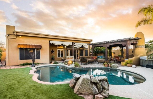 Pueblo-style home with private pool, patio, lovely yard, kiva fireplace, firepit