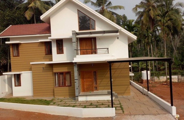 Villa de hierba púrpura en calicut cerca del camino wayanad. A 8 km de la ciudad. Quedarse en casa