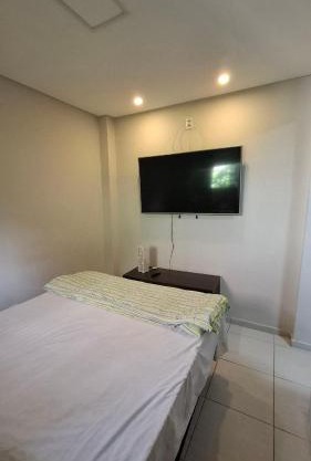 Quarto Duplo com cama extra, banheiro privativo e cozinha