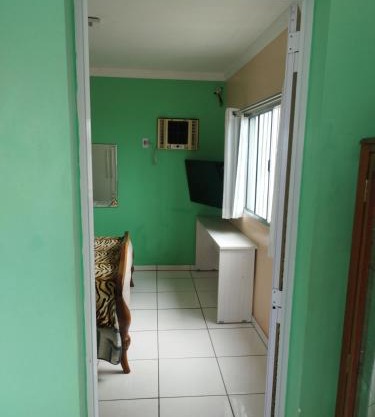 Quarto em casa compartilhado