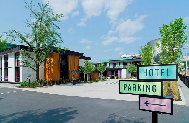 Queen ADA Trailer Stay w/ Vinyl Library, Outdoor Pool, Steps to Attractions!