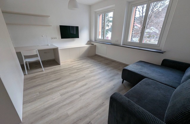 Quiet and modern vacation oasis in the middle of the village with dream views, garden & pool
