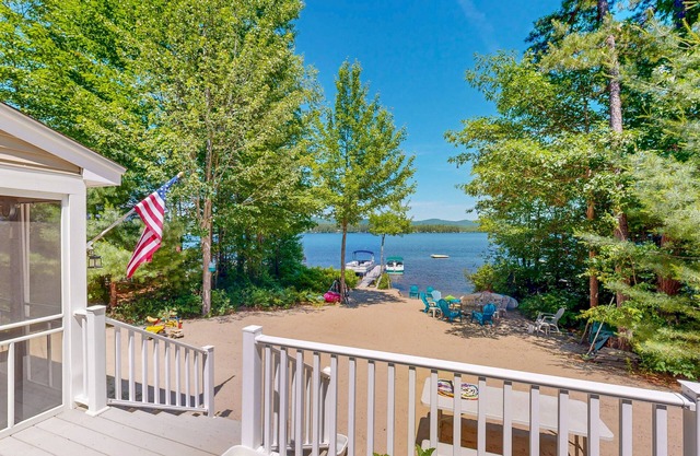Quiet lakefront home w/ private beach, dock, screened porch and stunning views