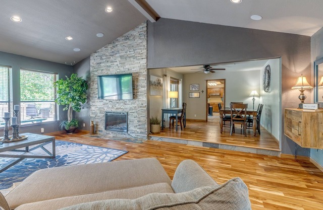Quiet, spacious home with large deck in secluded Forest Oaks in central Edmond .