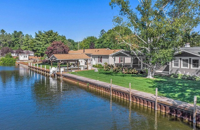 Quiet waterfront luxury home on quiet canal. Enjoy boat, beach, ski, & snow!