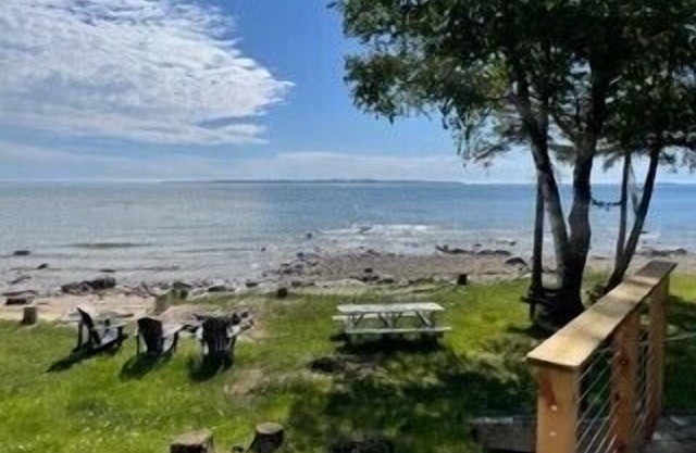 Rare and newly updated Lake Michigan home with breath taking sunsets.