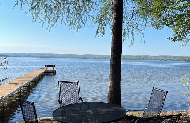 Rare Find.. in Petoskey , beautiful home sleeps 8 with lake frontage and woods.