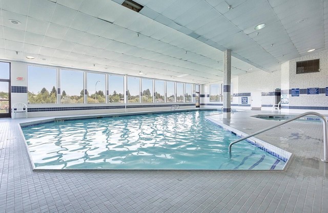 RARE FIND! ONE GORGEOUS UNIT! COMPLETE WITH SPA, POOL, HOT-TUB