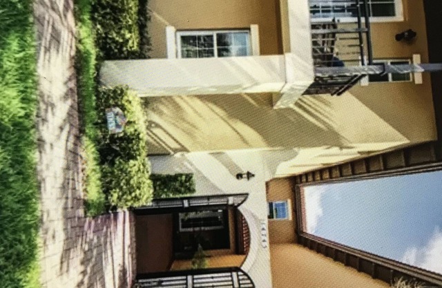 Recharge in this Mediterranean-style townhome