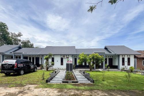 RedDoorz at Mbak Tinem Near Bandara Lubuk Linggau