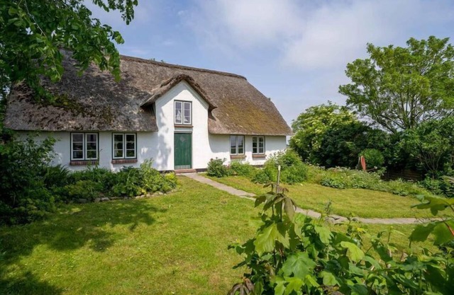 Reetgedecktes Ferienhaus en Westerhever con sauna
