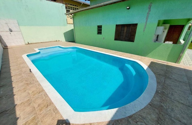 House with large swimming pool near the sea