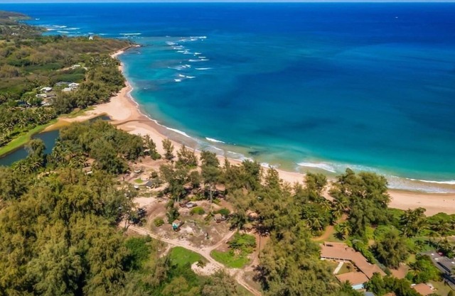Refreshed & spacious 5 br. Home designed for large groups is only steps to sand
