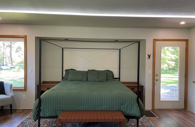 Relax and unwind while taking in nature on 5 acres in the pines with creeks!