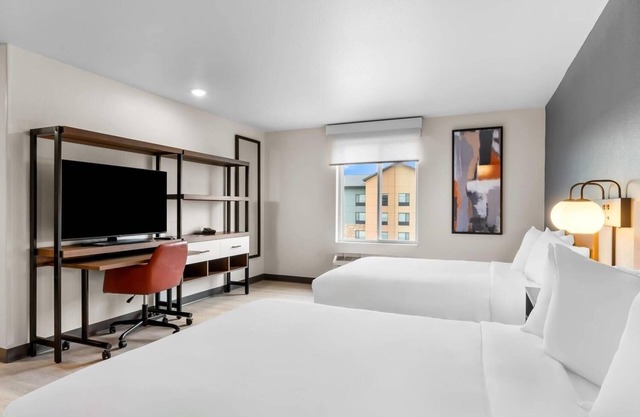 Relax in a Comfortable Suite w/ Fully Equipped Kitchen & Dedicated Workspace