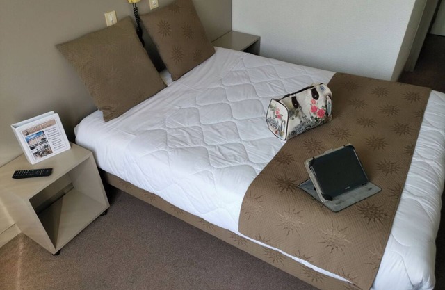 Relax in Comfort, Pet-Friendly Rooms with Parking and Easy Access to Attractions