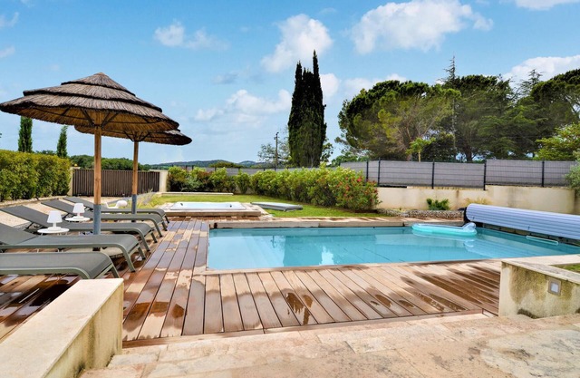 Relax in this vacation home with pool surrounded by beautiful nature.
