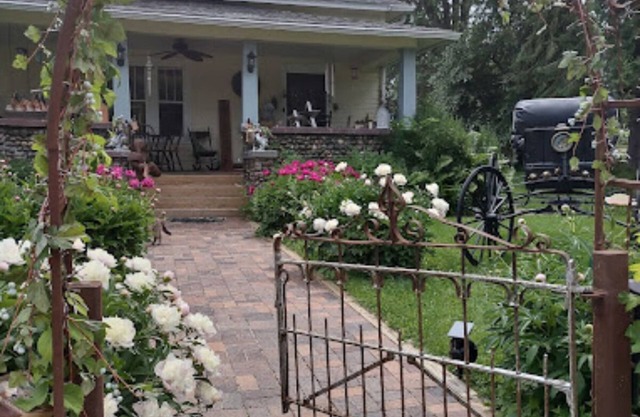 Relax in our English Garden King Suite at The Cobblestone Bed & Breakfast