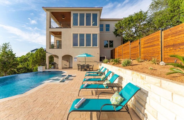 Elegant Lakeside Home w/ Infinity Pool, Game Room, & Scenic Views