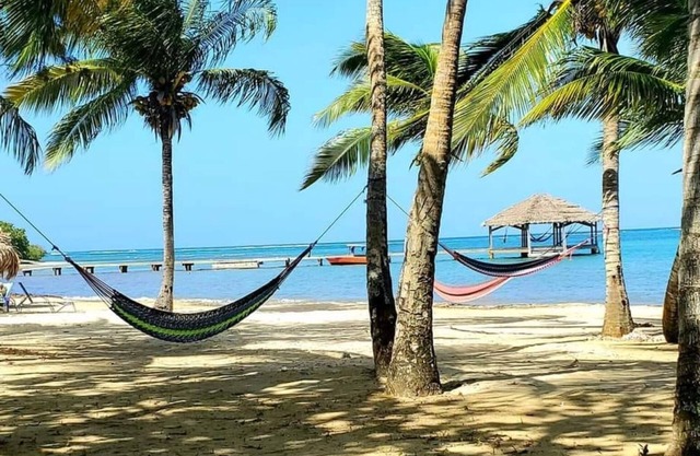 Relajante bungalow frente a la playa, las mejores puestas de sol, prístinos arrecifes = vacaciones perfectas
