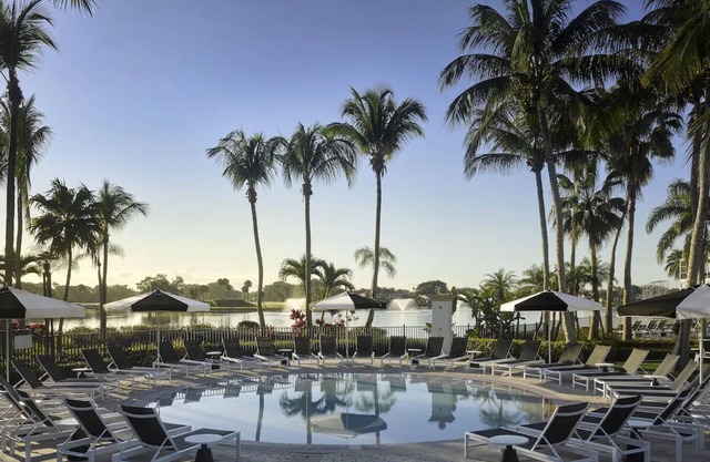 Relaxing PGA National Getaway with Sports Courts, Pools, and Kids Activities