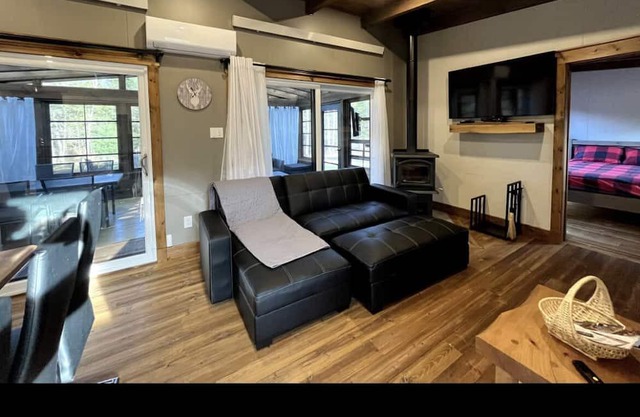Relaxing waterfront with hot tub and game room