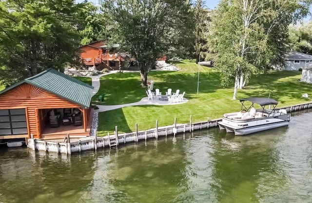 Remodeled riverfront home with private hot tub, firepit, grill, AC