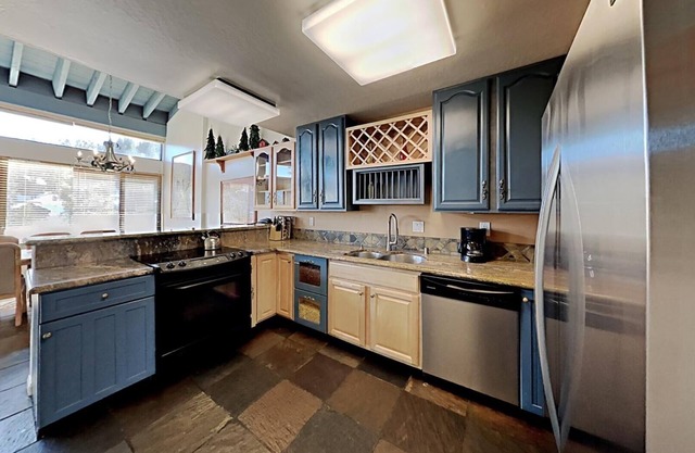 Remodeled Spacious Condo - Next to Car Charging, Hot Tubs, Village Gondola by RedAwning