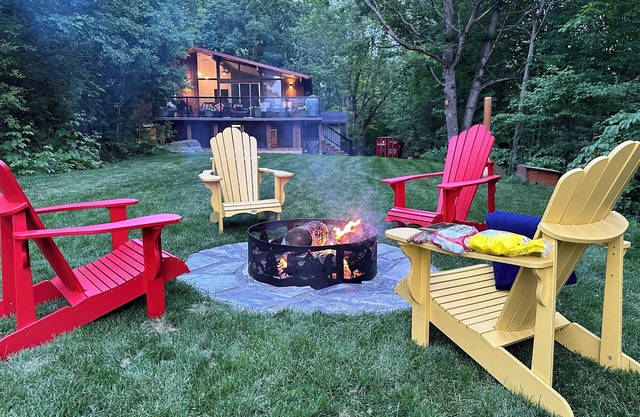 Renovated water front cottage w/firepit, multi level decks & screened in porch.