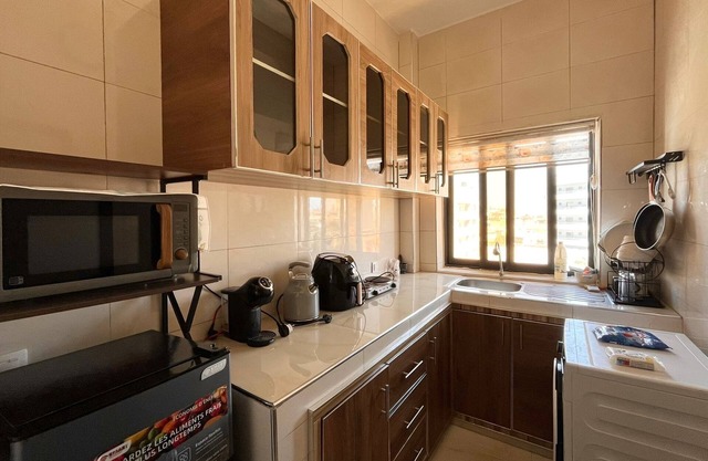 Résidence Atlantis bedroom kitchen toilet living room with balcony sea view