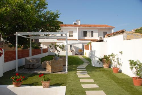 Residenza estiva con giardino vista mare Santa Lucia IUN T7288