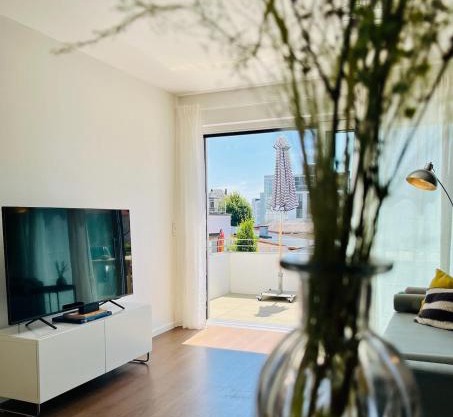 RESIDERY - Dein zentrales Apartment in urbanem Chic mit Balkon