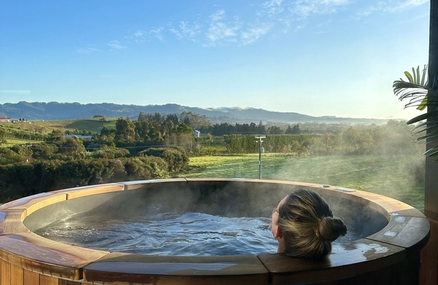 Retreat style home with hot tub, sauna, gym & country views. Great location!