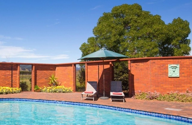 Richmond Plains Vineyard Cottage con piscina y botella de vino GRATIS.