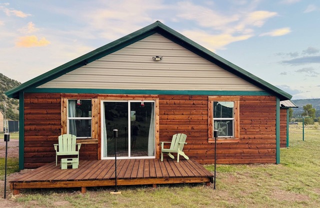 Ride the trails, reel in the fun, relax in the mountains at this Cozy Cabin