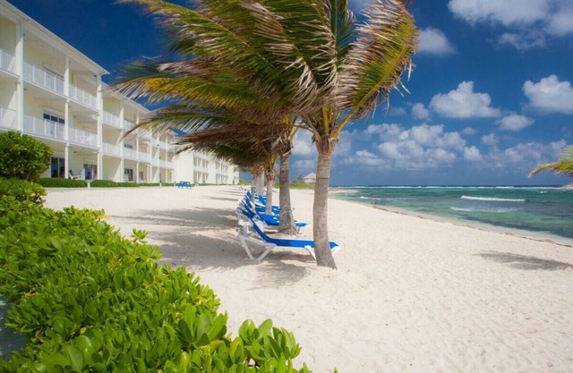 Right on the Beach! Ground Floor 2BD/2BA Condo at Castaways Cove in the East End