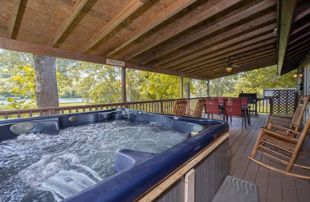 Riverfront Cabin with Bluff Views Covered Deck and Hot Tub