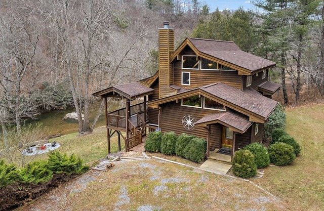 Riverfront Cabin with Hot Tub and Game Room