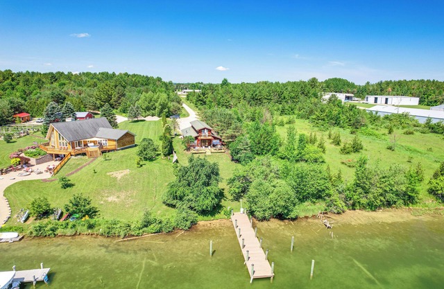 Riverfront Cheboygan Home w/ Dock ~ 4 Mi to Town!