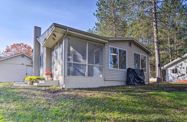 Riverfront Grayling Retreat w/ Fire Pit & Dock!