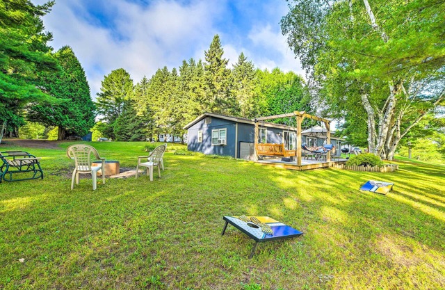 Riverfront Home w/ Dock ~ 6 Mi to Cheboygan!