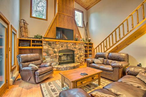 Riverfront Manton Cabin with Pool Table and Fire Pit!