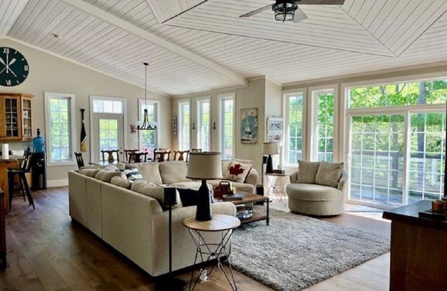 Riverside cottage w/ hot tub, firepit, indoor bar, and much more