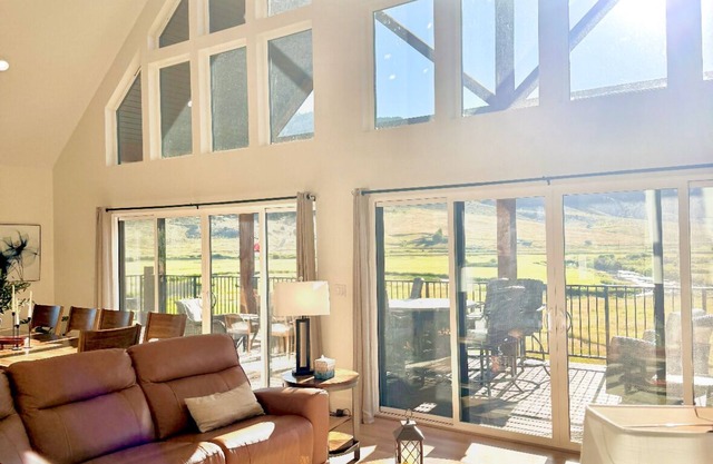 Riverside Luxury: Modern Mountain Retreat with Hot Tub and 3 King Suites!